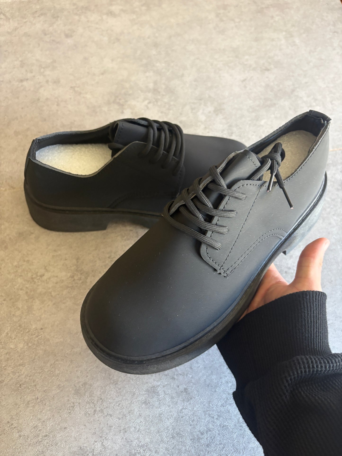 A, black chunky boots