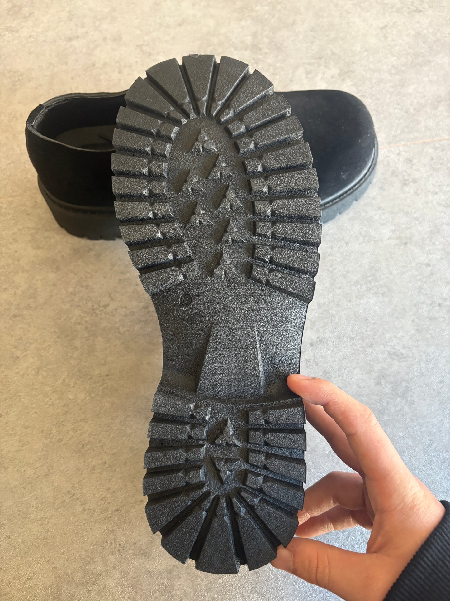 A , black suede “ runway “ boots