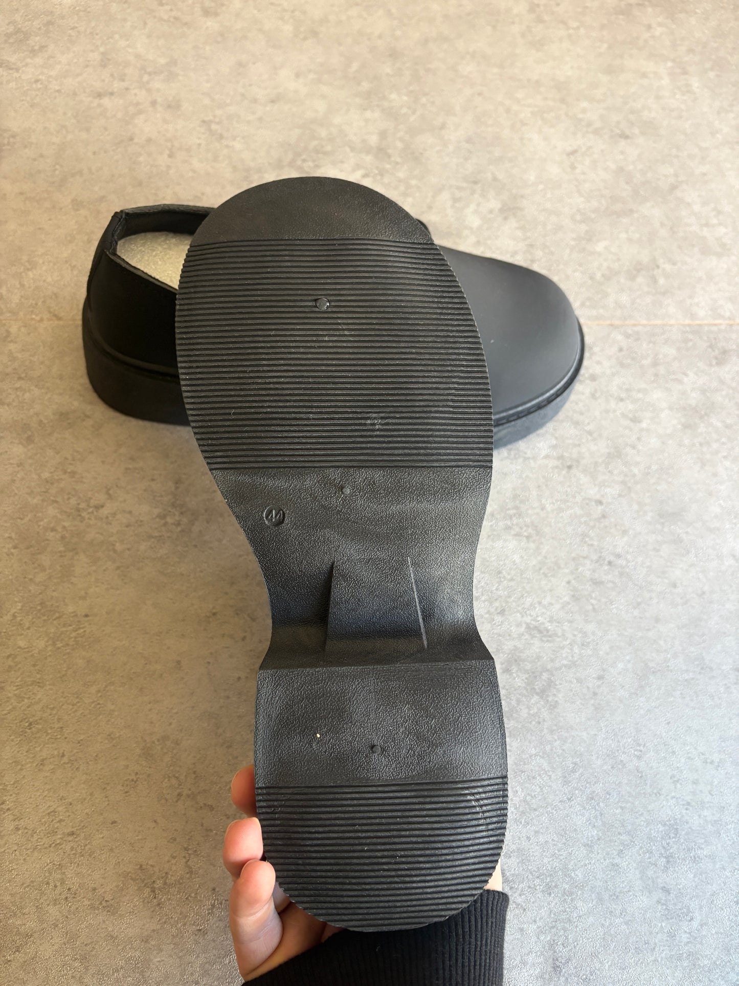 A, black chunky boots
