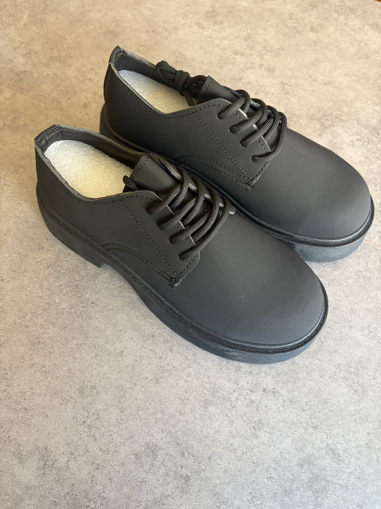 A, black chunky boots