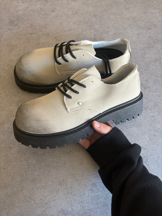 A , cream / black “ half “ boots